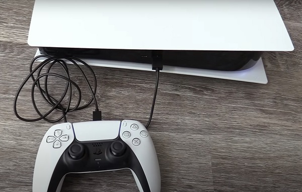 plug dual sense controller into PS5 console via usb port