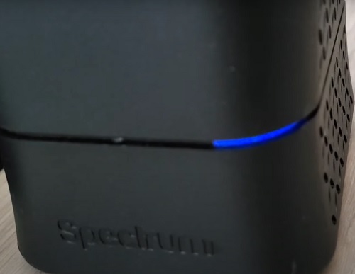 Spectrum router connected with solid blue light