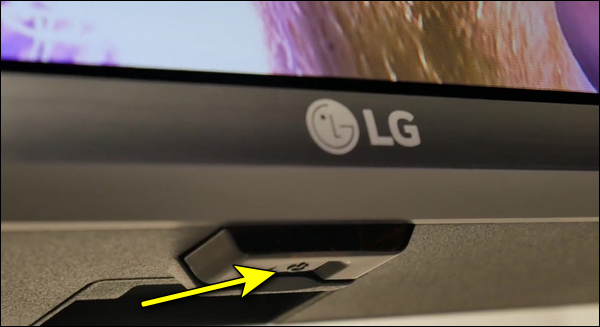 Press and hold the power button on your LG TV