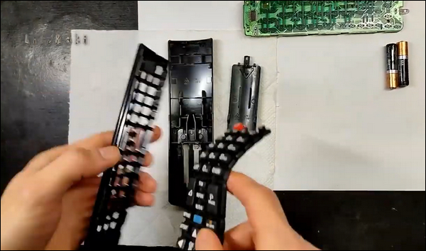 Take the TV remote’s inner components apart