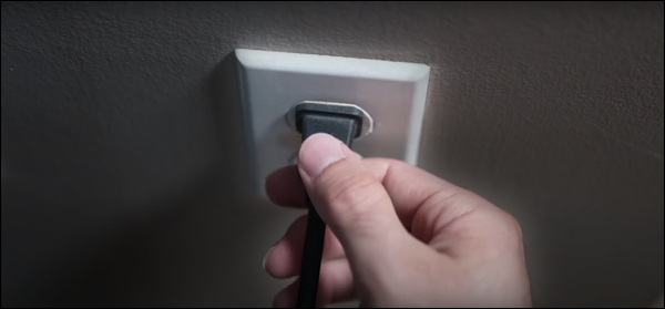 Turn off the TV by unplugging the power cord