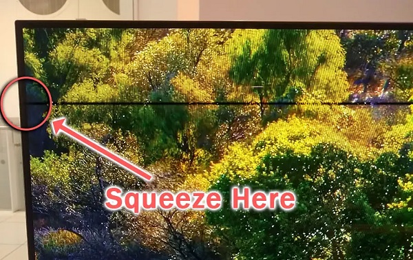 gently squeezing lcd panel of samsung tv